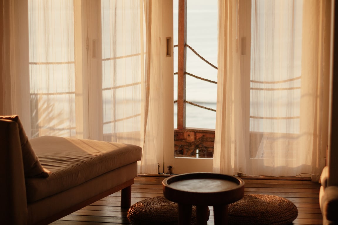 Wooden Round Table Near the Couch